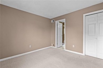 Don't miss out on this updated condo overlooking the peaceful on Louisquisset Golf Club in Rhode Island - for sale on GolfHomes.com, golf home, golf lot