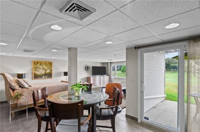 Don't miss out on this updated condo overlooking the peaceful on Louisquisset Golf Club in Rhode Island - for sale on GolfHomes.com, golf home, golf lot