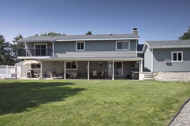 If you love to entertain family and friends, or just relax by on Lake Hills Golf Course in Montana - for sale on GolfHomes.com, golf home, golf lot