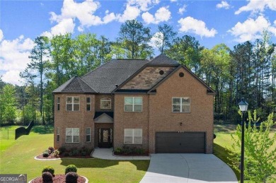 Welcome to 404 Prague Way, an exquisite residence nestled in the on Crystal Lake Golf and Country Club in Georgia - for sale on GolfHomes.com, golf home, golf lot