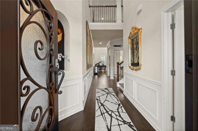 Welcome to 404 Prague Way, an exquisite residence nestled in the on Crystal Lake Golf and Country Club in Georgia - for sale on GolfHomes.com, golf home, golf lot