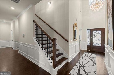 Welcome to 404 Prague Way, an exquisite residence nestled in the on Crystal Lake Golf and Country Club in Georgia - for sale on GolfHomes.com, golf home, golf lot