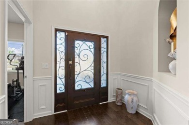 Welcome to 404 Prague Way, an exquisite residence nestled in the on Crystal Lake Golf and Country Club in Georgia - for sale on GolfHomes.com, golf home, golf lot