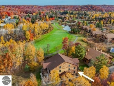 Vista Del Verde #4 is a peaceful corner condo that overlooks the on Schuss Mountain Golf Club in Michigan - for sale on GolfHomes.com, golf home, golf lot