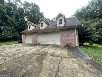 Welcome to 100 Goldfinch Circle-an all-brick ranch-style home on Turtle Cove Golf Course in Georgia - for sale on GolfHomes.com, golf home, golf lot