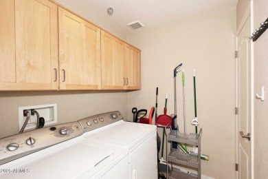 This private and spacious ground floor unit is situated directly on Scottsdale Silverado Golf Club in Arizona - for sale on GolfHomes.com, golf home, golf lot