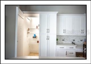 Welcome to your elevated sanctuary in the heart of Lansbrook on Lansbrook Golf Club in Florida - for sale on GolfHomes.com, golf home, golf lot