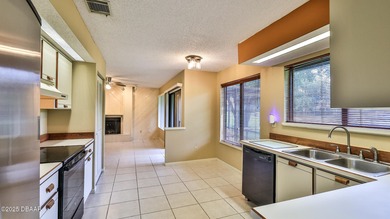 2 Premier suites, 2.5 baths - 2 story Glens Condominium in on Spruce Creek Golf Club in Florida - for sale on GolfHomes.com, golf home, golf lot