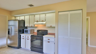 2 Premier suites, 2.5 baths - 2 story Glens Condominium in on Spruce Creek Golf Club in Florida - for sale on GolfHomes.com, golf home, golf lot