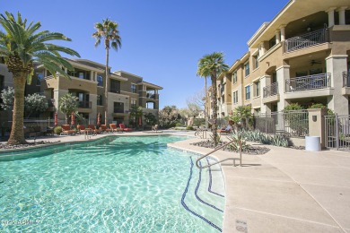 This private and spacious ground floor unit is situated directly on Scottsdale Silverado Golf Club in Arizona - for sale on GolfHomes.com, golf home, golf lot