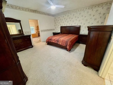 Welcome to 100 Goldfinch Circle-an all-brick ranch-style home on Turtle Cove Golf Course in Georgia - for sale on GolfHomes.com, golf home, golf lot