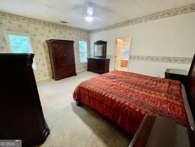 Welcome to 100 Goldfinch Circle-an all-brick ranch-style home on Turtle Cove Golf Course in Georgia - for sale on GolfHomes.com, golf home, golf lot