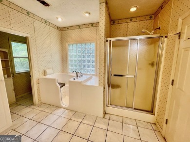 Welcome to 100 Goldfinch Circle-an all-brick ranch-style home on Turtle Cove Golf Course in Georgia - for sale on GolfHomes.com, golf home, golf lot