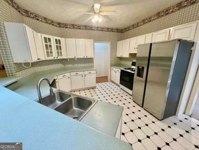 Welcome to 100 Goldfinch Circle-an all-brick ranch-style home on Turtle Cove Golf Course in Georgia - for sale on GolfHomes.com, golf home, golf lot