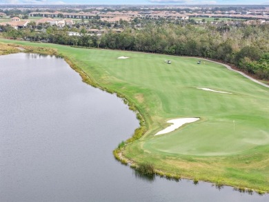 Indulge in the elegance of this TURNKEY Birkdale model located on Lakewood National Golf Club in Florida - for sale on GolfHomes.com, golf home, golf lot