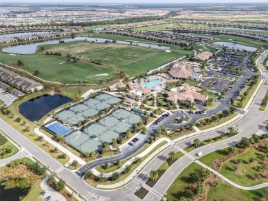 Indulge in the elegance of this TURNKEY Birkdale model located on Lakewood National Golf Club in Florida - for sale on GolfHomes.com, golf home, golf lot
