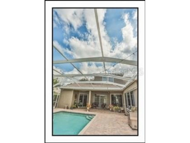 Welcome to your elevated sanctuary in the heart of Lansbrook on Lansbrook Golf Club in Florida - for sale on GolfHomes.com, golf home, golf lot