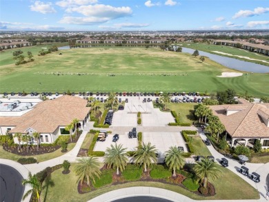 Indulge in the elegance of this TURNKEY Birkdale model located on Lakewood National Golf Club in Florida - for sale on GolfHomes.com, golf home, golf lot