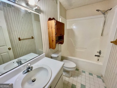 Welcome to 100 Goldfinch Circle-an all-brick ranch-style home on Turtle Cove Golf Course in Georgia - for sale on GolfHomes.com, golf home, golf lot