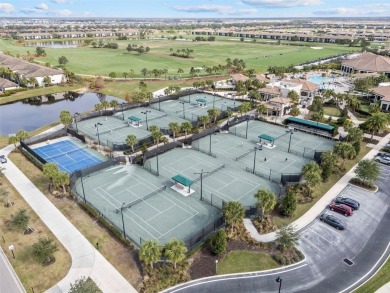 Indulge in the elegance of this TURNKEY Birkdale model located on Lakewood National Golf Club in Florida - for sale on GolfHomes.com, golf home, golf lot