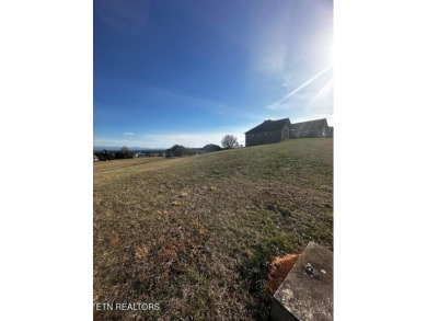 With spectacular mountain, lake and golf course views, this lot on Rarity Bay Country Club - Loudon in Tennessee - for sale on GolfHomes.com, golf home, golf lot