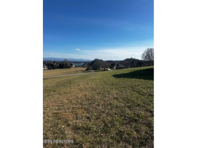 With spectacular mountain, lake and golf course views, this lot on Rarity Bay Country Club - Loudon in Tennessee - for sale on GolfHomes.com, golf home, golf lot