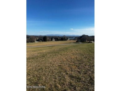 With spectacular mountain, lake and golf course views, this lot on Rarity Bay Country Club - Loudon in Tennessee - for sale on GolfHomes.com, golf home, golf lot