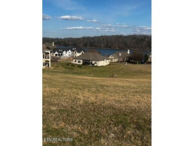With spectacular mountain, lake and golf course views, this lot on Rarity Bay Country Club - Loudon in Tennessee - for sale on GolfHomes.com, golf home, golf lot