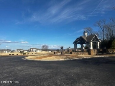 With spectacular mountain, lake and golf course views, this lot on Rarity Bay Country Club - Loudon in Tennessee - for sale on GolfHomes.com, golf home, golf lot