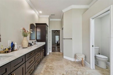 Under contract-accepting backup offers. Exquisite and with on East Lake Woodlands Country Club in Florida - for sale on GolfHomes.com, golf home, golf lot