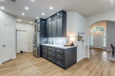 Beautifully Updated Home with Modern Upgrades Throughout. This on WestRidge Golf Course in Texas - for sale on GolfHomes.com, golf home, golf lot