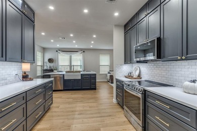 Beautifully Updated Home with Modern Upgrades Throughout. This on WestRidge Golf Course in Texas - for sale on GolfHomes.com, golf home, golf lot