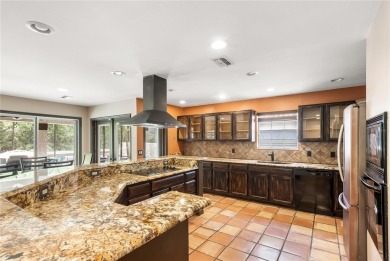 THIS MEDITERRANEAN POOL HOME HAS IT ALL - LOCATION, LUXURY on Feather Sound Country Club in Florida - for sale on GolfHomes.com, golf home, golf lot