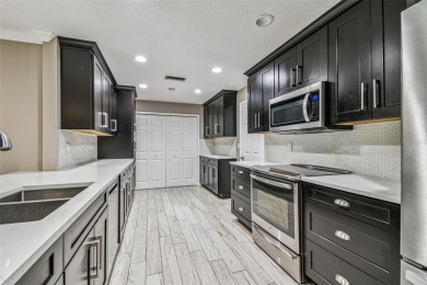 Welcome home! This beautifully updated and well-maintained on Mainlands Golf Club in Florida - for sale on GolfHomes.com, golf home, golf lot