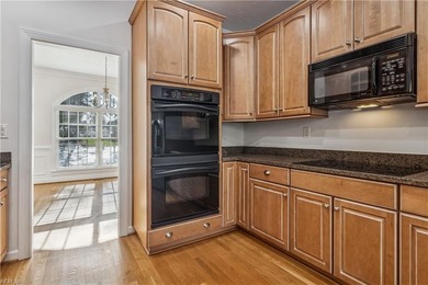 Nestled on a 1.2-acre cul-de-sac lot in Stonehouse, this 2817 sq on The Tradition Golf Club At Stonehouse in Virginia - for sale on GolfHomes.com, golf home, golf lot