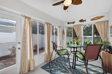 CUTE AS A BUTTON. METICULOUSLY MAINTAINED. GATED COMMUNITY WITH on Meadow Oaks Golf and Country Club in Florida - for sale on GolfHomes.com, golf home, golf lot