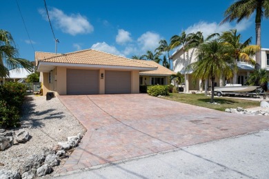 NEW Pool, NEW 15,000 lb Elevator Lift, NEW Garage Doors, NEW on Key Colony Beach Golf Course in Florida - for sale on GolfHomes.com, golf home, golf lot