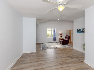A newly renovated residence with a stunning water view is poised on Sarasota National Golf Club in Florida - for sale on GolfHomes.com, golf home, golf lot