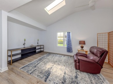 A newly renovated residence with a stunning water view is poised on Sarasota National Golf Club in Florida - for sale on GolfHomes.com, golf home, golf lot