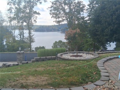 Amazing panoramic lake views from front and back of home. This on Lake Mohawk Golf Club in Ohio - for sale on GolfHomes.com, golf home, golf lot