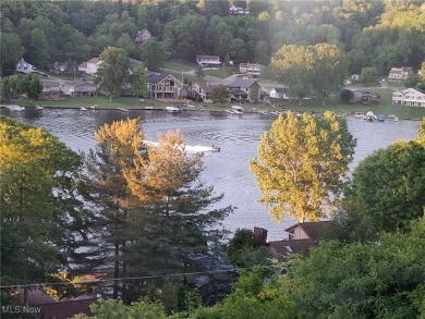 Amazing panoramic lake views from front and back of home. This on Lake Mohawk Golf Club in Ohio - for sale on GolfHomes.com, golf home, golf lot