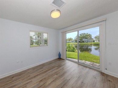 A newly renovated residence with a stunning water view is poised on Sarasota National Golf Club in Florida - for sale on GolfHomes.com, golf home, golf lot