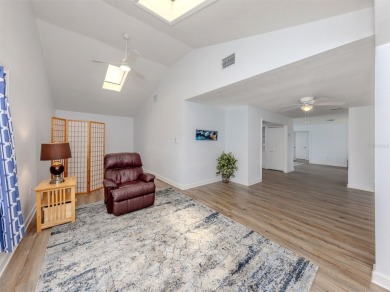 A newly renovated residence with a stunning water view is poised on Sarasota National Golf Club in Florida - for sale on GolfHomes.com, golf home, golf lot