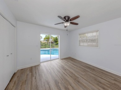 A newly renovated residence with a stunning water view is poised on Sarasota National Golf Club in Florida - for sale on GolfHomes.com, golf home, golf lot