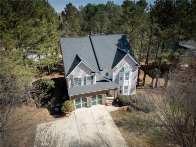 The highly sought-after Heron Bay community, featuring a lake on Canongate At Heron Bay in Georgia - for sale on GolfHomes.com, golf home, golf lot
