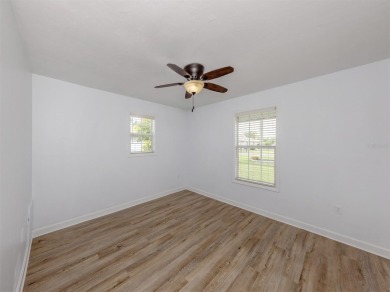 A newly renovated residence with a stunning water view is poised on Sarasota National Golf Club in Florida - for sale on GolfHomes.com, golf home, golf lot
