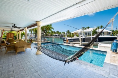 NEW Pool, NEW 15,000 lb Elevator Lift, NEW Garage Doors, NEW on Key Colony Beach Golf Course in Florida - for sale on GolfHomes.com, golf home, golf lot