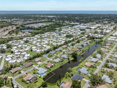 A newly renovated residence with a stunning water view is poised on Sarasota National Golf Club in Florida - for sale on GolfHomes.com, golf home, golf lot