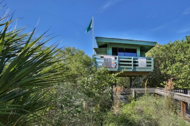 A newly renovated residence with a stunning water view is poised on Sarasota National Golf Club in Florida - for sale on GolfHomes.com, golf home, golf lot