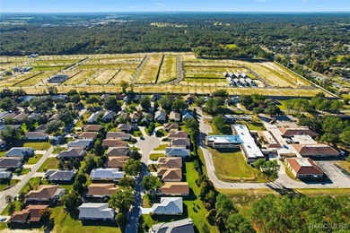 Indulge in the quintessential Florida lifestyle within the on Brentwood Farms Golf Club in Florida - for sale on GolfHomes.com, golf home, golf lot